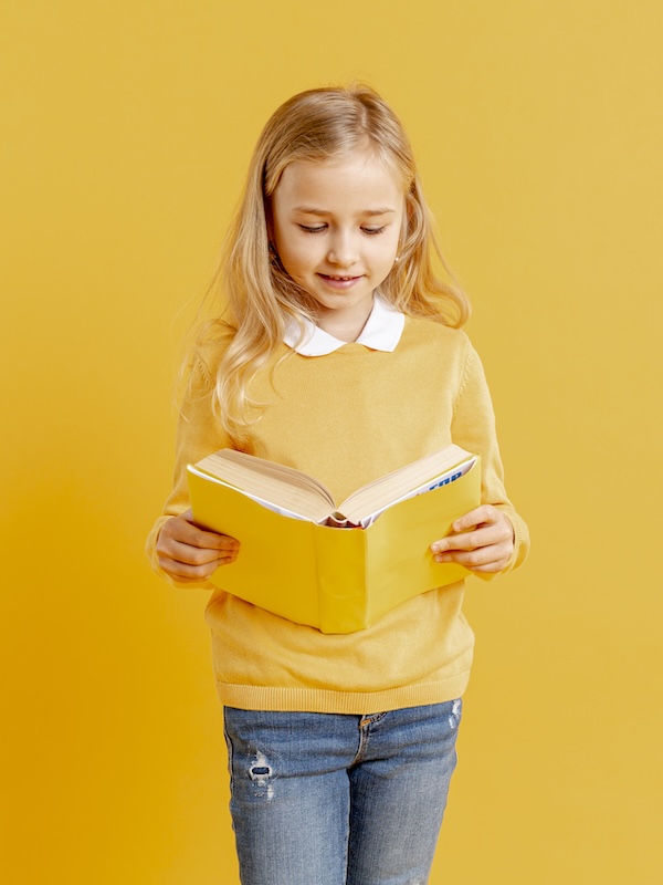 the girl reading from a high angle