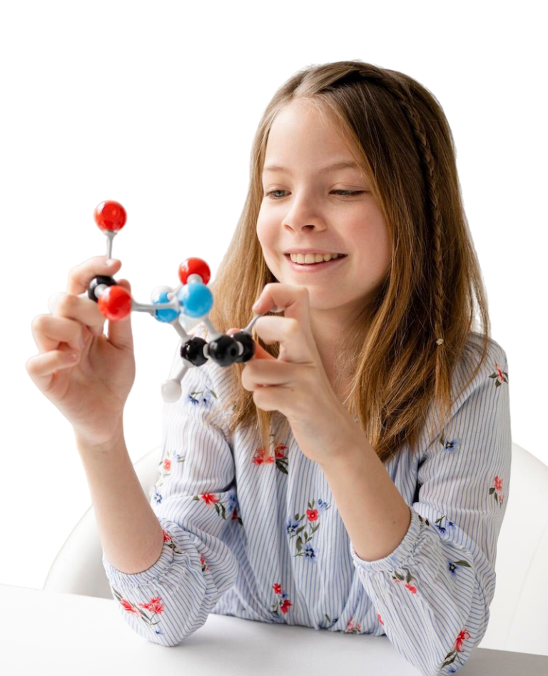 Portrait of a smiling girl holding a table
