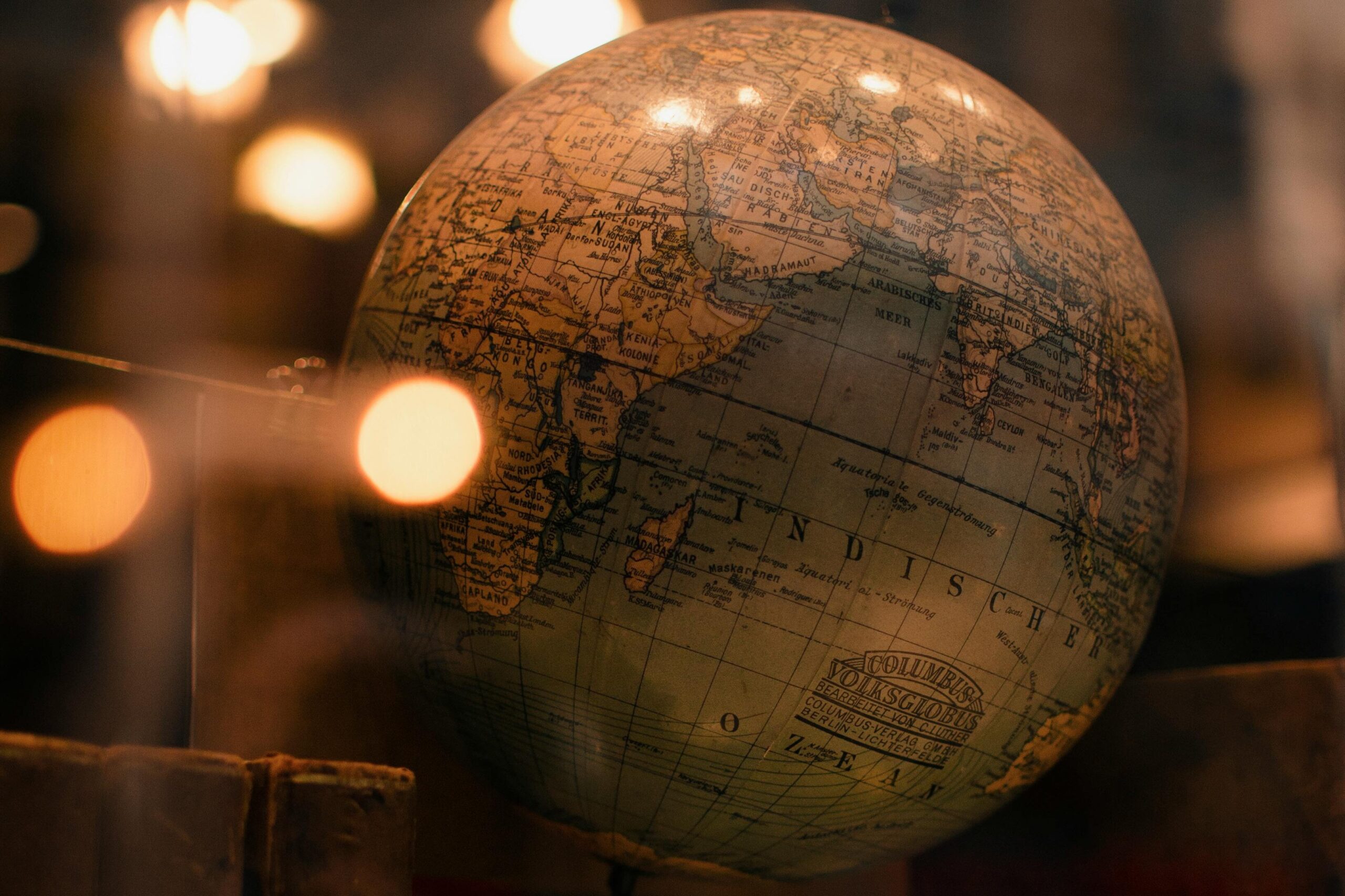 a close up on a globe, warm background