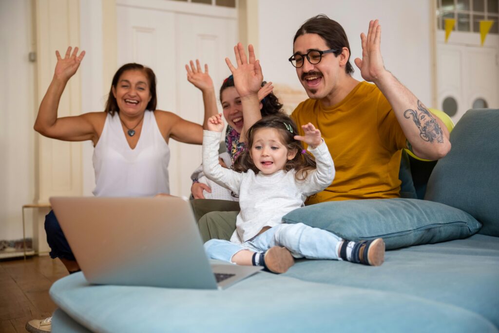 A family with a small child is having a videocall
