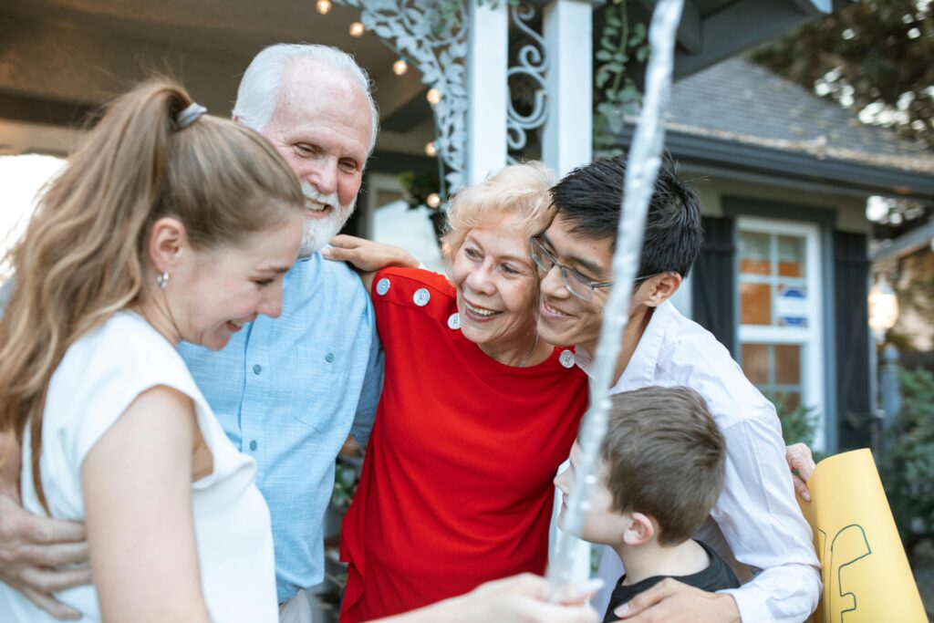 a multigenerational family embracing