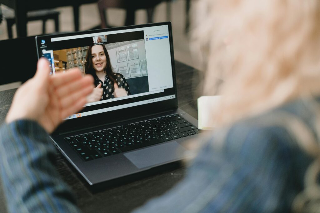 A teacher and a teenager are having a videocall