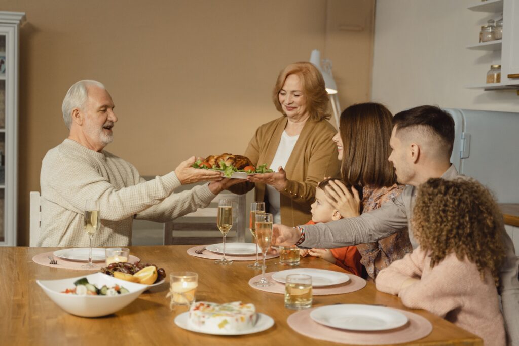 A family dinner where a child learns the polite words