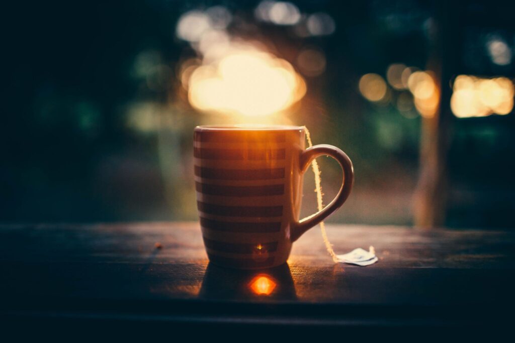 A mug of hot tea by the window