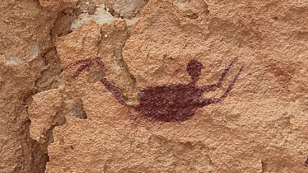 A true rock painting from the Cave of the Swimmers in Wadi Surra, Egypt. The large-scale schematic «swimmer» allows us to see the pose, the significance of which is discussed in the article.